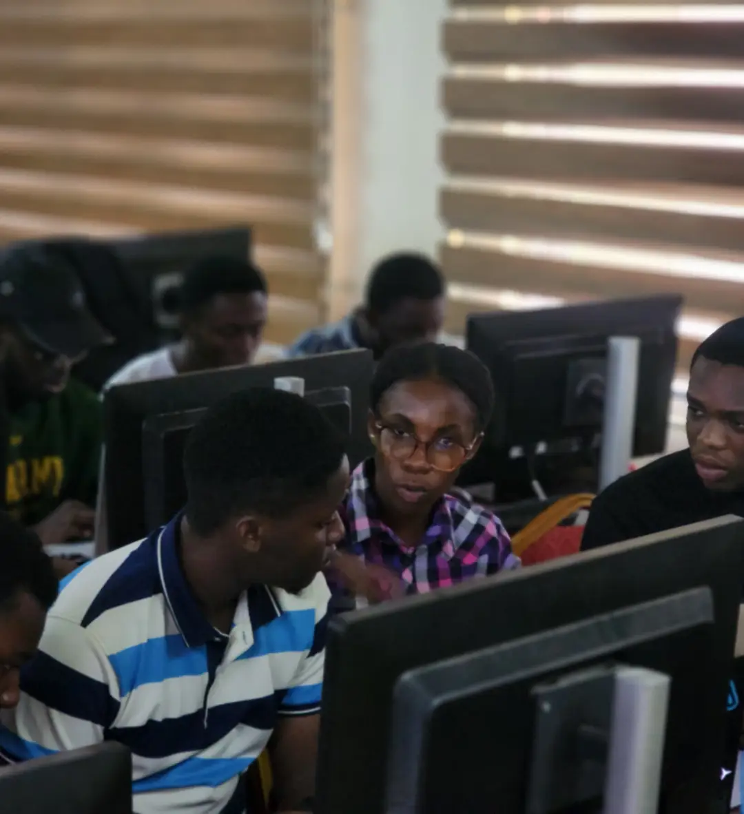 UMaT pre-hackathon 2026: students coding in the computer lab