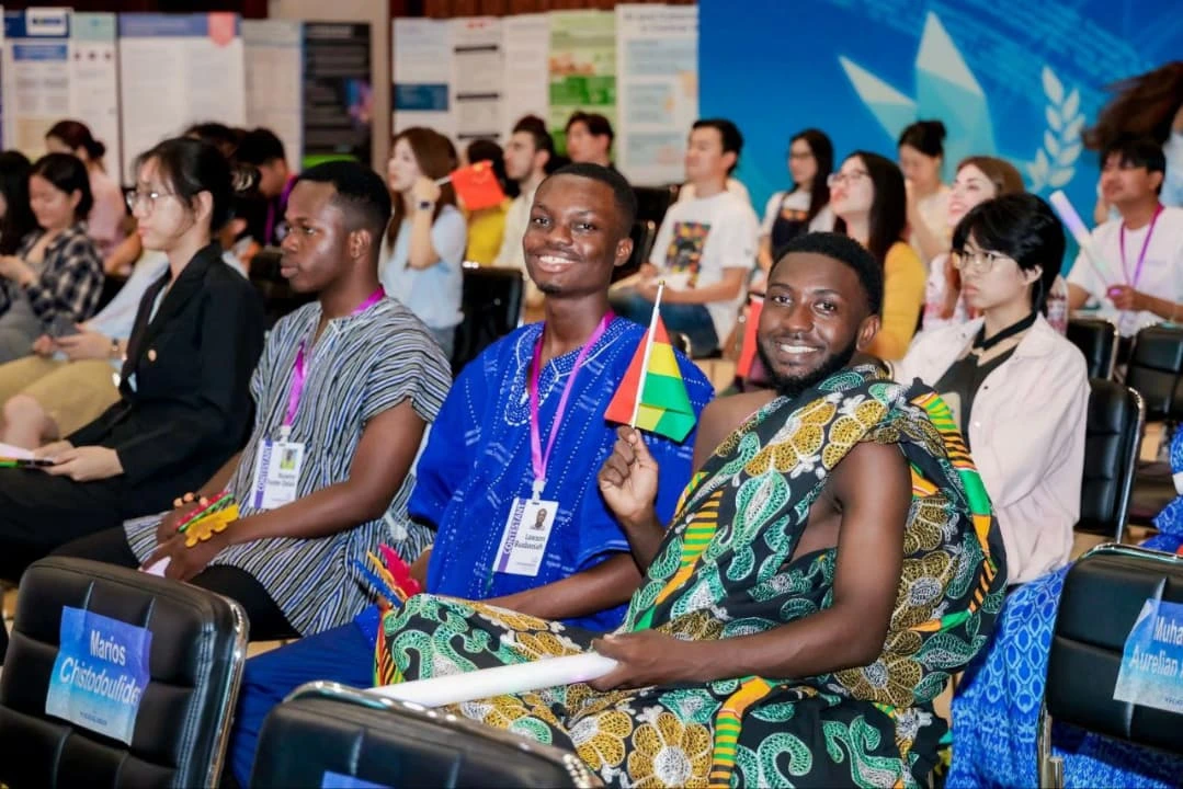 YICGG 2025: students with Ghana flags in the audience